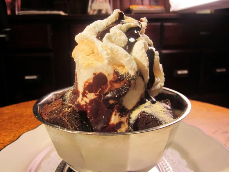 This newer-school soda fountain channels the ice cream fountains of yesteryear with classic ingredients, old-time decor and classic ice cream parlor service. The Mt. Vesuvius is an eruption of flavors: Chocolate or vanilla ice cream is piled on top of brownies, topped with a layer of hot fudge and malt powder “ash,” and crowned with a dollop of whipped cream.