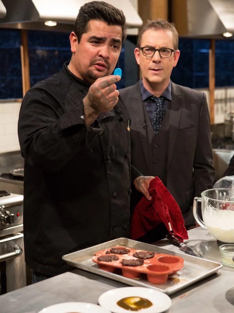 Chopped host Ted Allen checks in on chef Aaron Sanchez as he works on his dessert, as seen on Food Network's Chopped After Hours, Season 24.