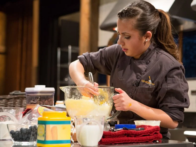 16 year old Yazmene Kaylani as she works on her dessert that must include: fruit chew candies, instant yogurt pudding mix, tortilla chips and blueberries for Chopped Teen Week $25,000 tournament, as seen on Food Network's Chopped, Season 25.
