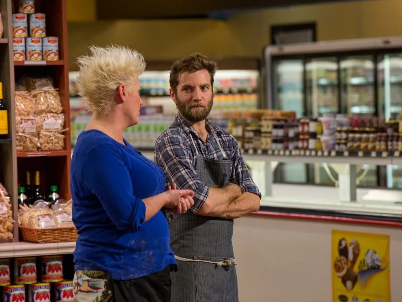Celebrity Chefs Anne Burrell and Marcel Vigneron during judging for Game 3, Food Wheel, as seen on Food Network's Guy's Grocery Games, Season 7.