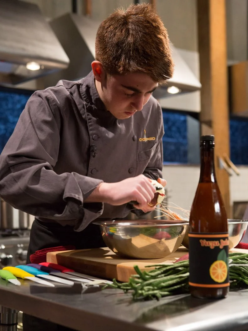 17 year old Nino Asaro works on his appetizer that must include: wild langoustines, asian long beans, yuzu juice and Japanese sweet potatoes for Chopped Teen Week $25,000 tournament, as seen on Food Network's Chopped, Season 25.