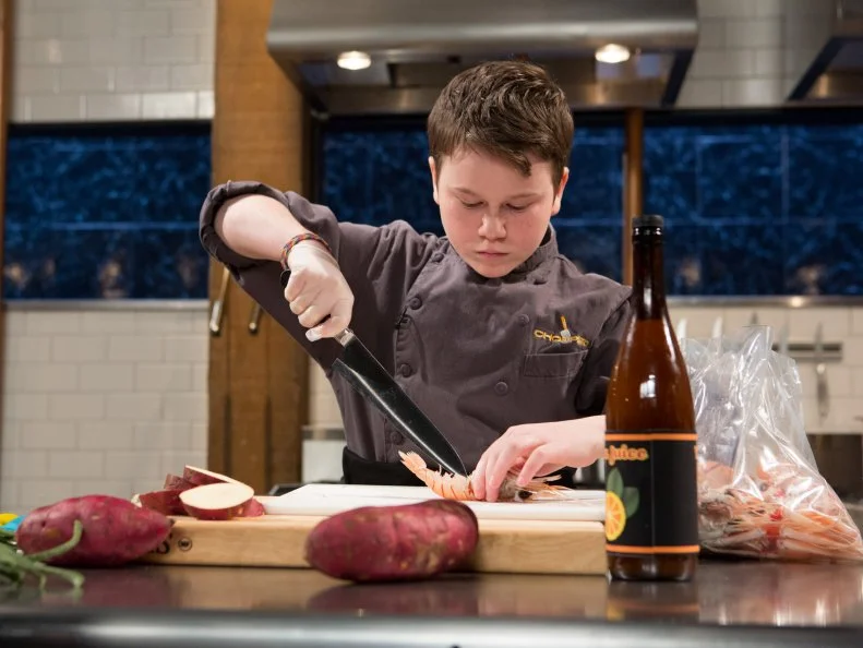 13 year old Peter Wenger works on his appetizer that must include: wild langoustines, asian long beans, yuzu juice and Japanese sweet potatoes for Chopped Teen Week $25,000 tournament, as seen on Food Network's Chopped, Season 25.