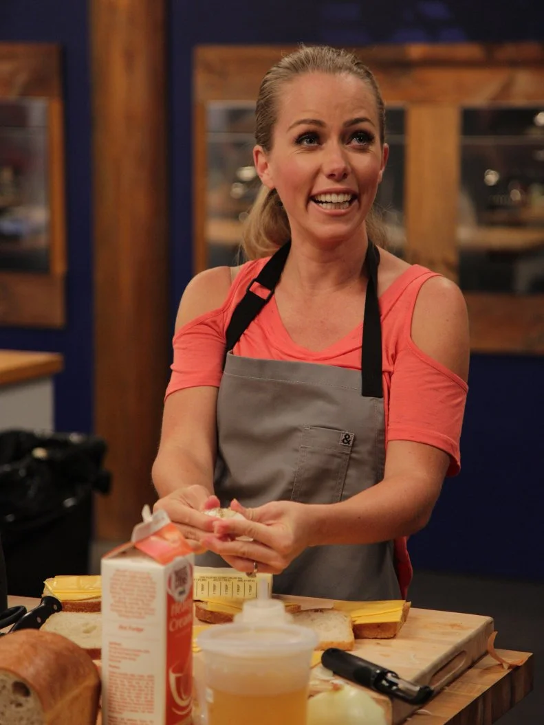 Contestant Kendra Wilkinson, in the kitchen, as seen on Food Networkâ  s Worst Cooks in America: Celebrity Edition, Season 7.