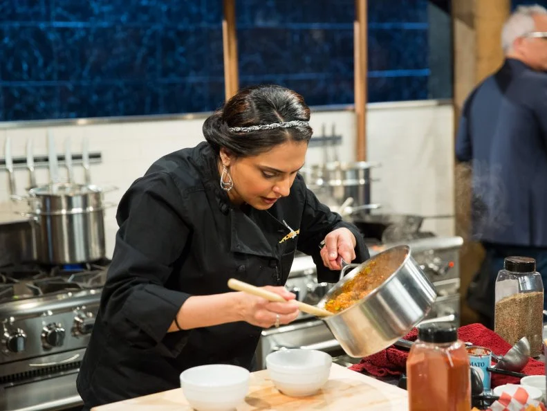 Maneet Chauhan during a carnival theme webisode cooking with hot beef sundae,deep fried ravioli, asparagus, and deep fried canned ham, as seen on Food Networkâ  s Chopped, season 24.