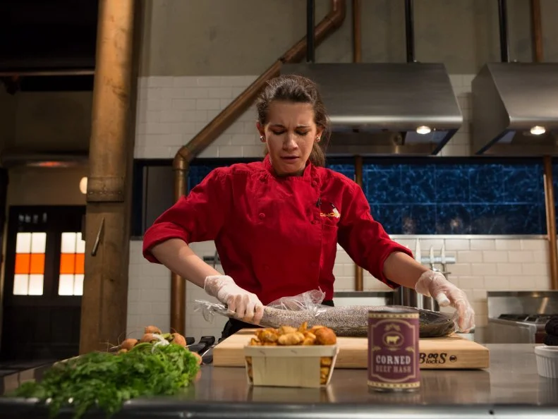 Teen Chopped champion 15 year old Veronica Seguin works on her entree that must include: whole tile fish, baby planet carrots, chanterelle mushrooms and corned beef hash for Chopped Teen Week $25,000 tournament, as seen on Food Network's Chopped, Season 25.