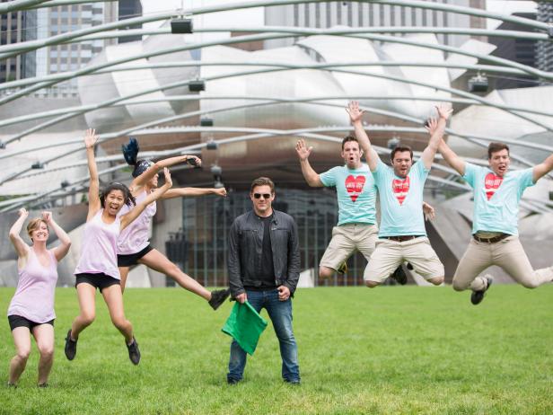 Host Tyler Florence poses with Team Waffle Love's Steven Terry, Adam Terry and Jared Terry, Team Pho-Nomenal's Becca Ruffin, Sophia Woo and Sunny Lin at Millenium Park in Chicago, Illinois, as seen on Food Network's, The Great Food Truck Race, Season 6.