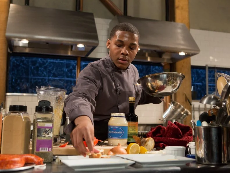 16 year old Justin Ballenger works on his appetizer that must include: spicy Italian sausage, white asparagus, habanero peppers and soup dumplings for Chopped Teen Week $25,000 tournament, as seen on Food Network's Chopped, Season 25.