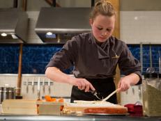 13 year old Olivia Neumark works on her appetizer that must include: spicy Italian sausage, white asparagus, habanero peppers and soup dumplings for Chopped Teen Week $25,000 tournament, as seen on Food Network's Chopped, Season 25.
