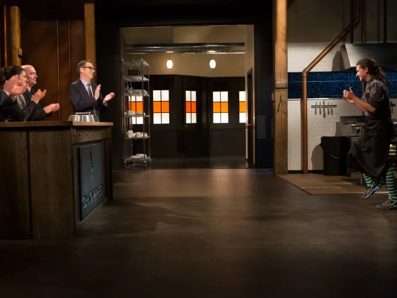 15 year old Veronica Seguin is congratulated by Chopped host Ted Allen and judges: Scott Conant, Alex Guarnaschelli and Chris Santos after becoming a Chopped Champion and won the last spot in the $25000 tournament for Chopped Teen Week $25,000 tournament, as seen on Food Network's Chopped, Season 25.