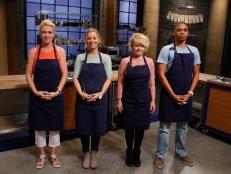 The blue team recruits pose together before elimination on the set of Food Network's Worst Cooks in America, Season 8.