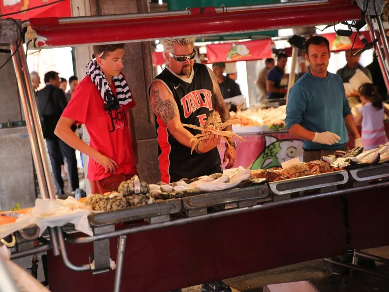 Guy and Hunter Fieri at the fish market in Venice, Italy as seen on Food Network's Guy's European Vacation episode 2