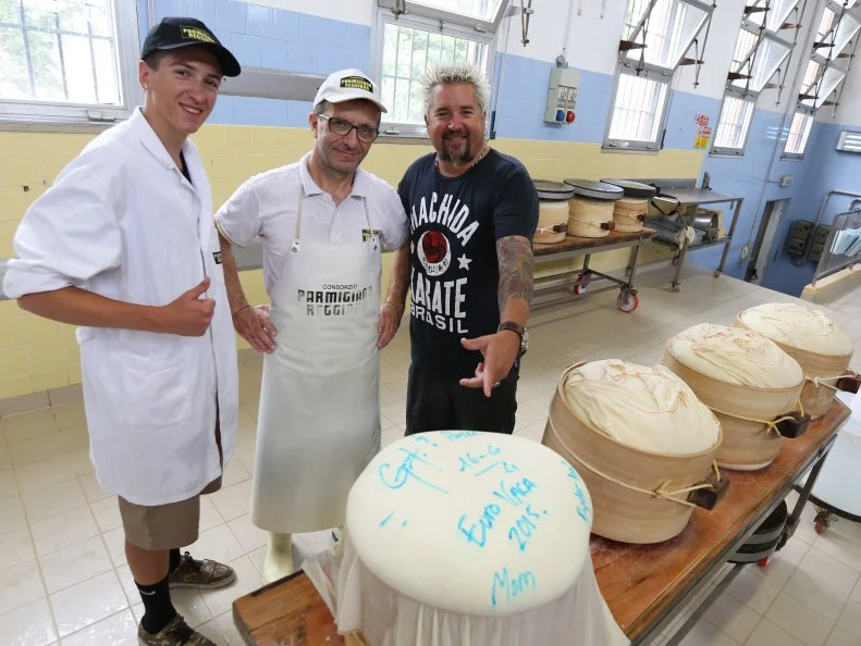 Portrait shot of Guy, Hunter and the cheese maker from Consorzio del Formaggio Parmigiano Reggiano in Parma, Italy as seen on Food Network's Guy's European Vacation episode 3.