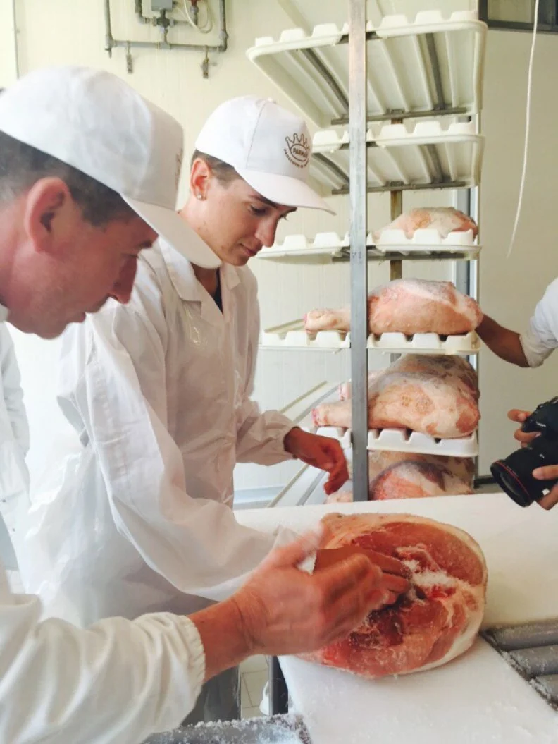 Hunter Fieri at La Perla Prosciutteria in Parma, Italy learning how to make prosciutto as seen on Food Network's Guy's European Vacation episode 3.