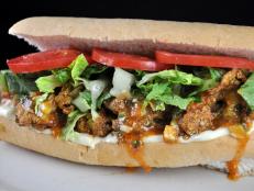 Housed in a former bakery left vacant after Hurricane Katrina, High Hat draws the crowds with Southern eats of the savory sort. A standout is the Oyster Remoulade Po' Boy: Fried Gulf oysters are tossed in a tangy vinaigrette-based remoulade, then piled on a hunk of fluffy bread with a crunchy crust.