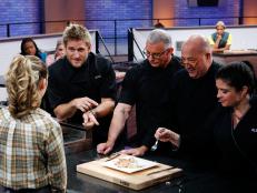 Mentors, from left, Curtis Stone, Robert Irvine, Andrew Zimmern and Alex Guarnaschelli taste Anna Cooper's first round dish as seen on Food Network's All-Star Academy, Season 2.