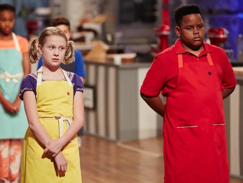 Contestants, Jane Haviland and Alex Portis, during the challenge, Lunchbox Desserts, as seen on Food Network’s Kids Baking Championship, Season 2.