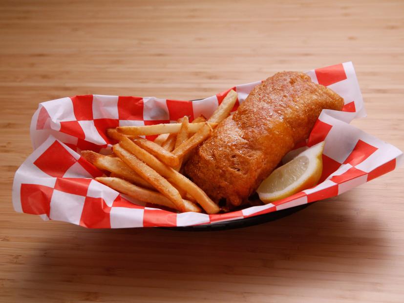 Host Anne Burrell's demonstrates her Fish and Chips is displayed on the set of Food Network's Worst Cooks in America, Season 8.
