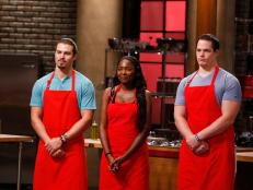 The red team recruits receive their elimination challenge as seen on Food Network's Worst Cooks in America, Season 8.