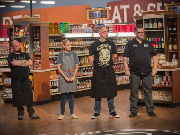 Contestants Todd Ginsberg, Suzanne Vizethann, Eric Williams and Richard Hales listen to judges, as seen on Food Network's Guy’s Grocery Games, Season 8.
