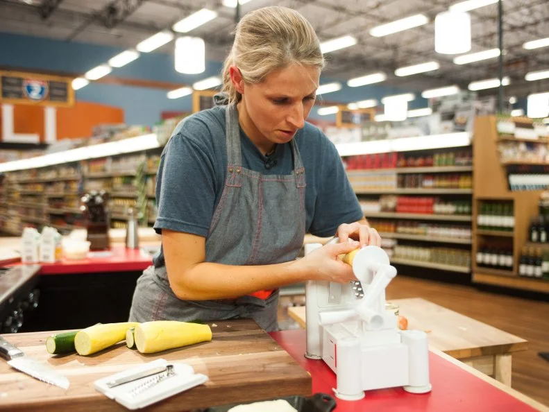 Contestant Suzanne Vizethann cooks, as seen on Food Network's Guy’s Grocery Games, Season 8.