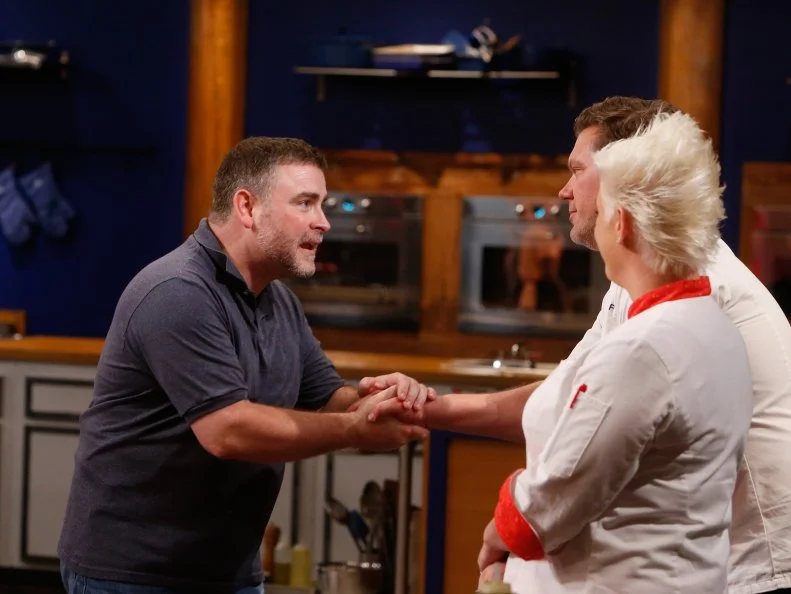 Blue team recruit Ernest Adkins reacts as he is eliminated from the competition as seen on Food Network's Worst Cooks in America, Season 8.