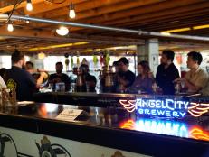 Craft beers get star billing at this brewery housed in a cavernous, century-old building in downtown Los Angeles. All the brews served here are made on-site, down to the hops grown on the rooftop, as Michael Symon found out when he stopped by for a visit. He couldn&rsquo;t leave without trying the top-selling Angel City IPA, which he described as having &ldquo;good hops and a little bit of citrus.&rdquo;