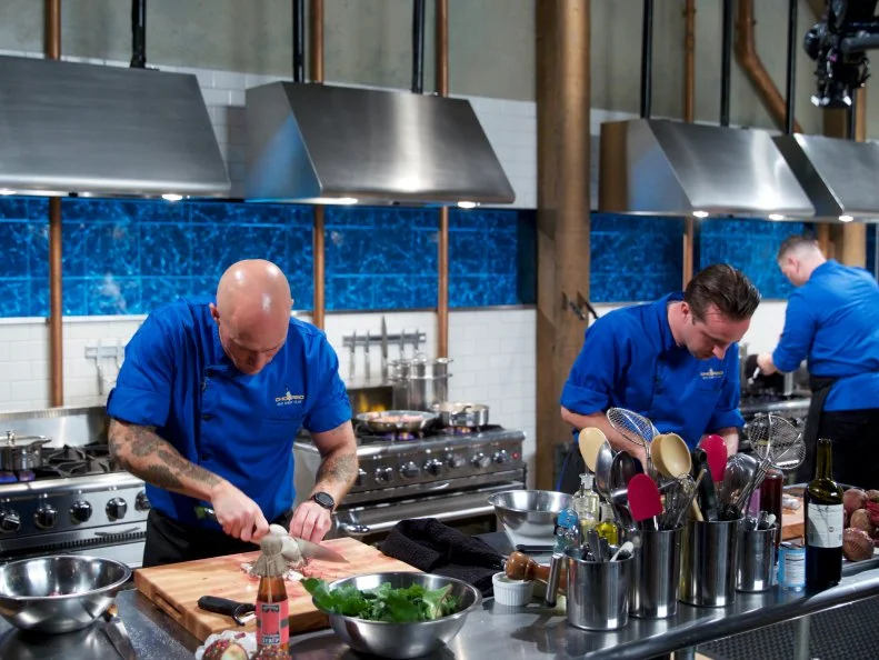 Chefs Jay Abrams (L), Bradley Stellings, and Demetrio Zavala during the entrŽe round, as seen on Food Network's Chopped, Season 31.
