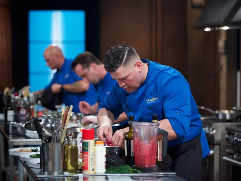 Chefs Jay Abrams (L), Bradley Stellings, and Demetrio Zavala during the entrŽe round, as seen on Food Network's Chopped, Season 31.