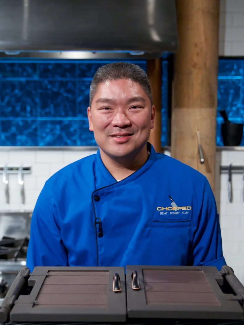 Chef Seis Kamimura poses on set, as seen on Food Network's Chopped, Season 31.