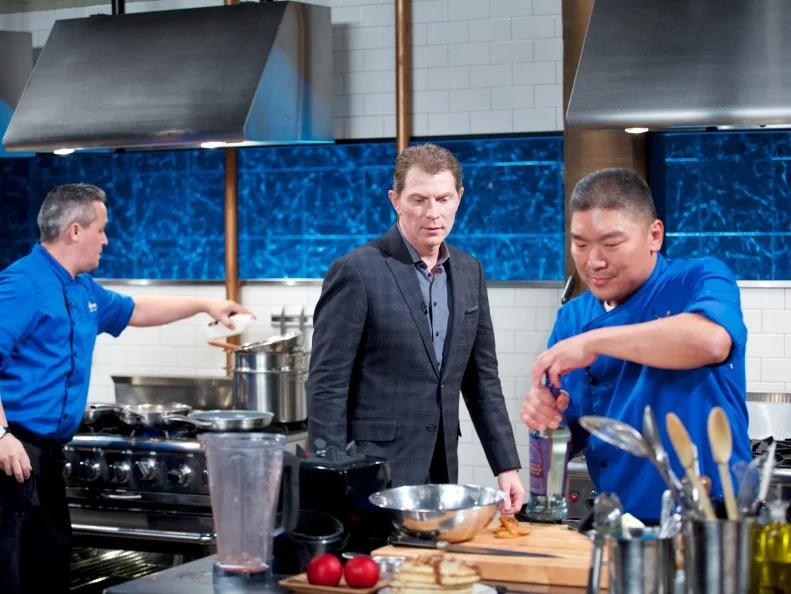Chef Cory Morris (L), judge Bobby Flay and chef Seis Kamimura during the dessert round, as seen on Food Network's Chopped, Season 31.