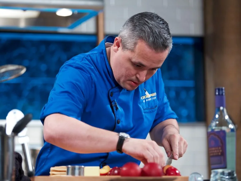 Chef Cory Morris cooks Cinnamon bun pancake with maple brown butter plums, a licorice sea salt caramel, sautŽed pecans and creme fraiche butter during the dessert round, as seen on Food Network's Chopped, Season 31.