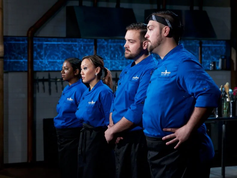 Chefs Aarthi Sampath (L), Kathy Fang, and twins Matt Romine, and Mike Romine during the judging of the appetizer round, as seen on Food Network's Chopped, Season 31.