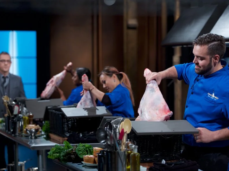 Host Ted Allen (L) with chefs Aarthi Sampath, Kathy Fang, and Matt Romine, during the entrŽe round, as seen on Food Network's Chopped, Season 31.