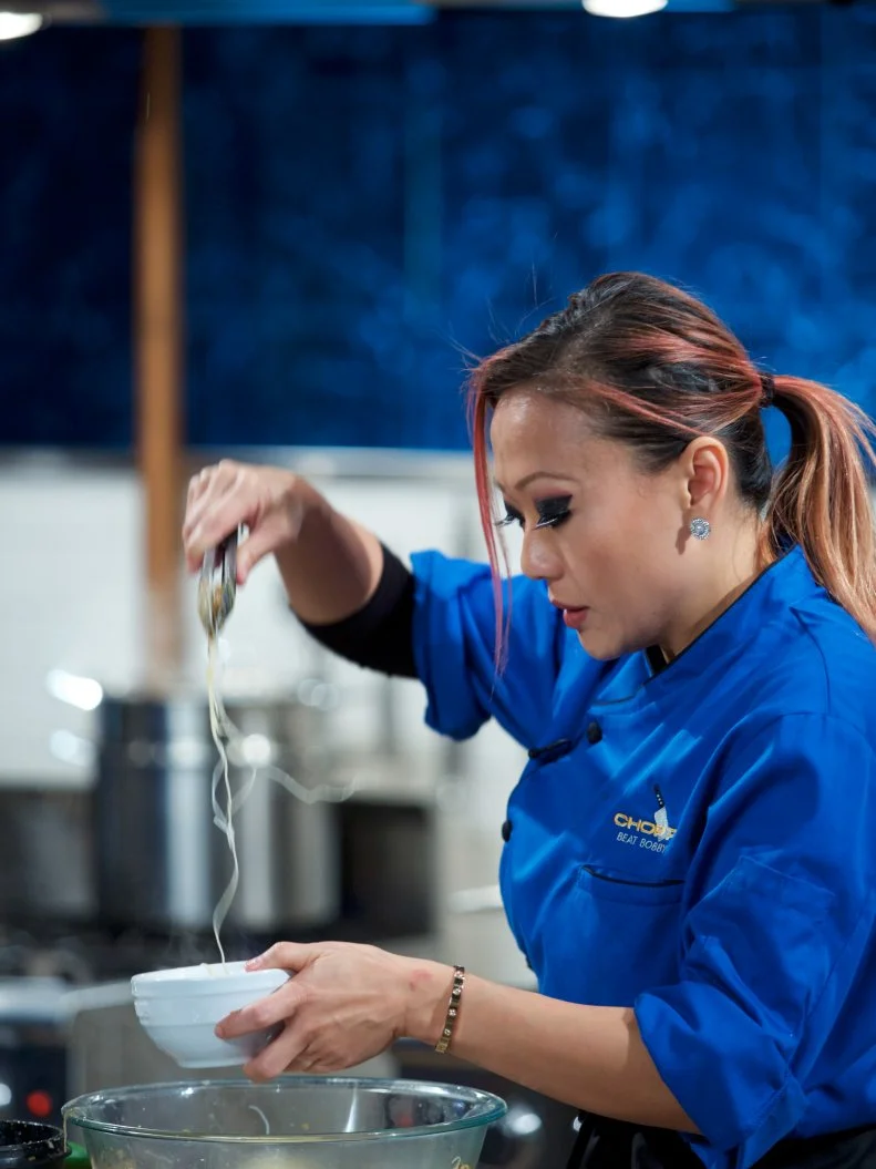 Chef Kathy Fang cooks Camel coconut slaw lao mien during the appetizer round, as seen on Food Network's Chopped, Season 31.