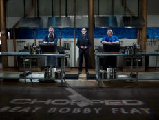Chef Bobby Flay (L), Host Ted Allen and chef Seis Kamimura during the final round three signature dish, as seen on Food Network's Chopped, Season 31.