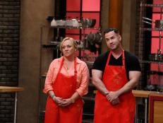 Nicole Sullivan and Mike "The Situation" Sorrentino of the red team appear, as seen on Food Network's Worst Cooks in America, Season 9.