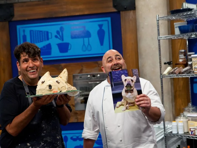 Contestant David Rosenberg and Host Duff Goldman show Host Lorraine Pascale how David's cake looks compared to the photo, as seen on Food Network's Worst Bakers In America, Season 1.