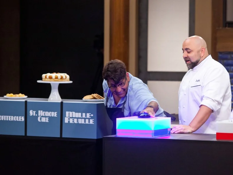 Contestant David Rosenberg plays a new game called "Name That Pastry" where contestants will receive a variety of pastries that they will have to properly name. The team that names them the quickest wins. Each team will have to take a tray of pastry and place it on the propper box with the correct name of that pastry.  As seen on Food Network's Worst Bakers In America, Season 1.