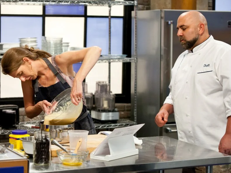 Finalist Samantha Brown works on her chocolate cream pie for her final baking challenge, as seen on Food Network's Worst Bakers In America, Season 1.