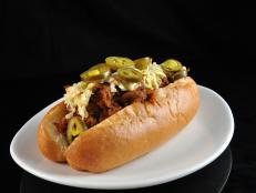 This joint serves &ldquo;the best barbecue in Detroit,&rdquo; according to Michael Symon, who has been an avid fan since the restaurant&rsquo;s first years. It seems many locals agree, as they flock here for standout dishes that include The Charlene. Succulent pulled pork is tossed in a sauce made from the meat&rsquo;s drippings, then stuffed into a soft yet sturdy bun and topped with a mound of coleslaw and pickled jalapenos. Another popular pick is the Yardbird, which features smoked chicken doused in mustard sauce.
