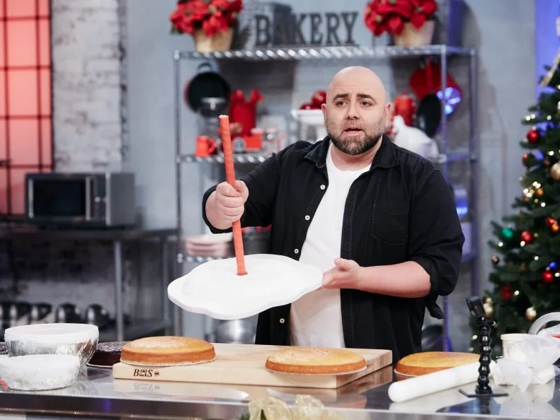Host Duff Goldman preparing his dish, Snowman, as seen on Food Network's Holiday Baking Championship: Duff's Sweet Spot, Season 3.