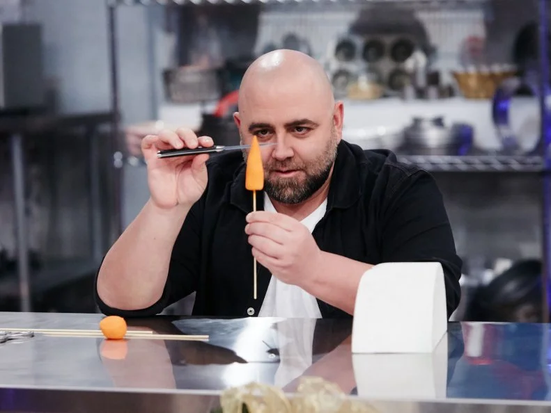 Host Duff Goldman preparing his dish, Snowman, as seen on Food Network's Duff's Sweet Spot, Season 3.