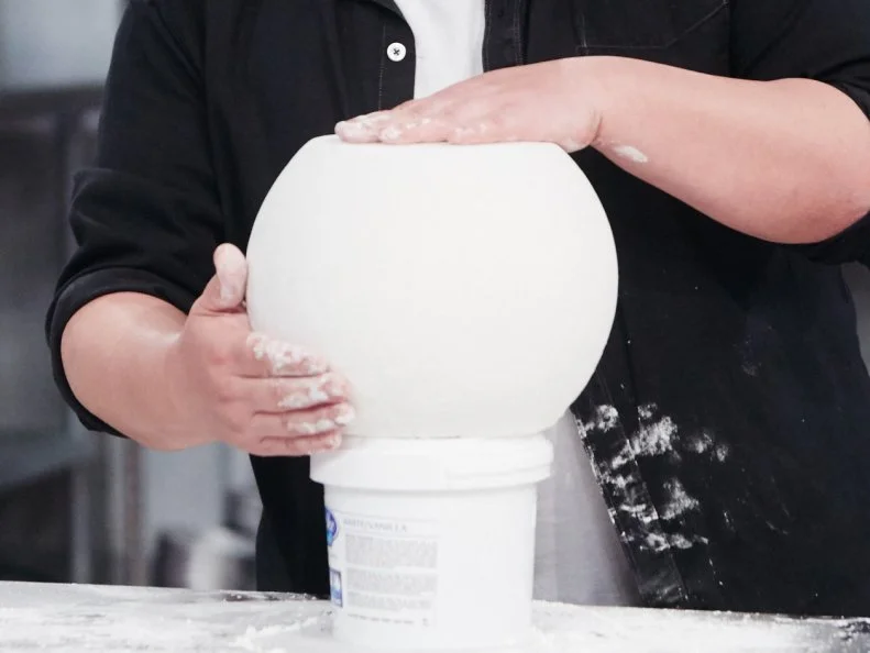 Host Duff Goldman preparing his dish, Snowman, as seen on Food Network's Holiday Baking Championship: Duff's Sweet Spot, Season 3.