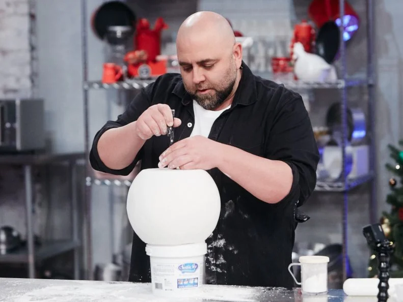 Host Duff Goldman preparing his dish, Snowman, as seen on Food Network's Duff's Sweet Spot, Season 3.