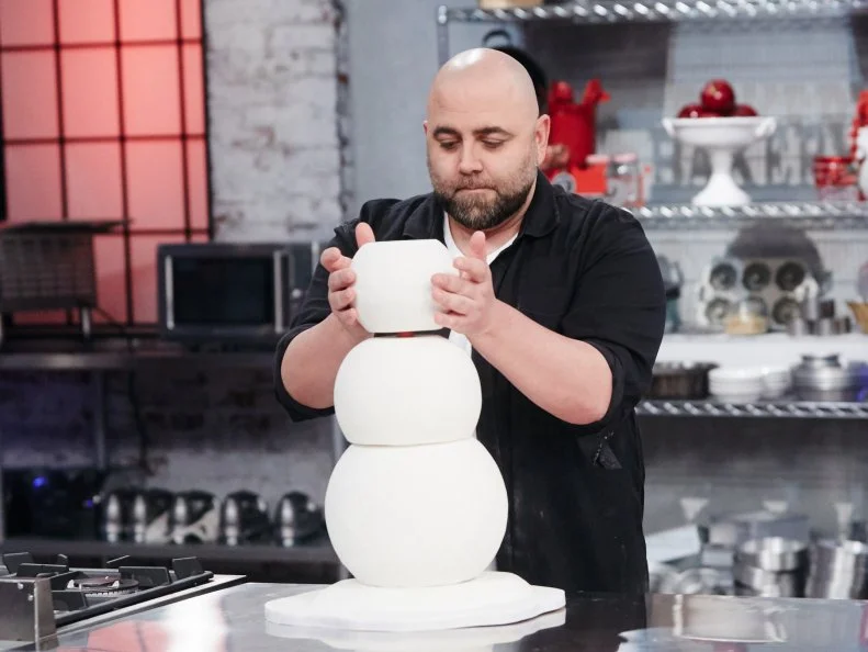 Host Duff Goldman preparing his dish, Snowman, as seen on Food Network's Holiday Baking Championship: Duff's Sweet Spot, Season 3.