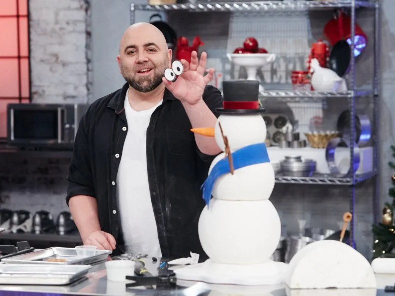Host Duff Goldman preparing his dish, Snowman, as seen on Food Network's Holiday Baking Championship: Duff's Sweet Spot, Season 3.