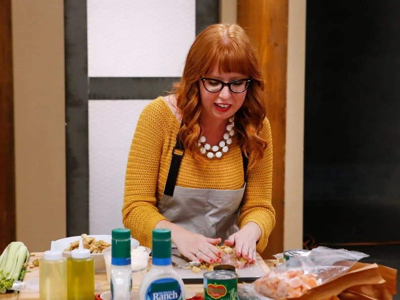 Buffy Mykkanen cooks during the baseline challenge, as seen on Food Network's Worst Cooks in America, Season 10.