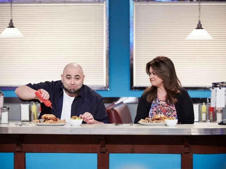 Hosts Duff Goldman and Valerie Bertinelli during the reveal of the Main Heat, as seen on Food Network's Kids Baking Championship, Season 3.