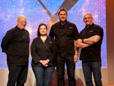 Celebrity chefs and mentors of episode 2 All Star Academy. From left to right: Andrew Zimmern, Alex Guarnaschelli, Curtis Stone, and Robert Irvine, as seen on the Food Network's All Star Academy, Season 2.