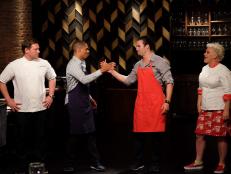 Hosts Anne Burrell and Tyler Florence stand with with contestants Nick Slater and Lawrence Crawford during the announcement of the winner of the final menu challenge, as seen on Food Network’s Worst Cooks In America, Season 8.